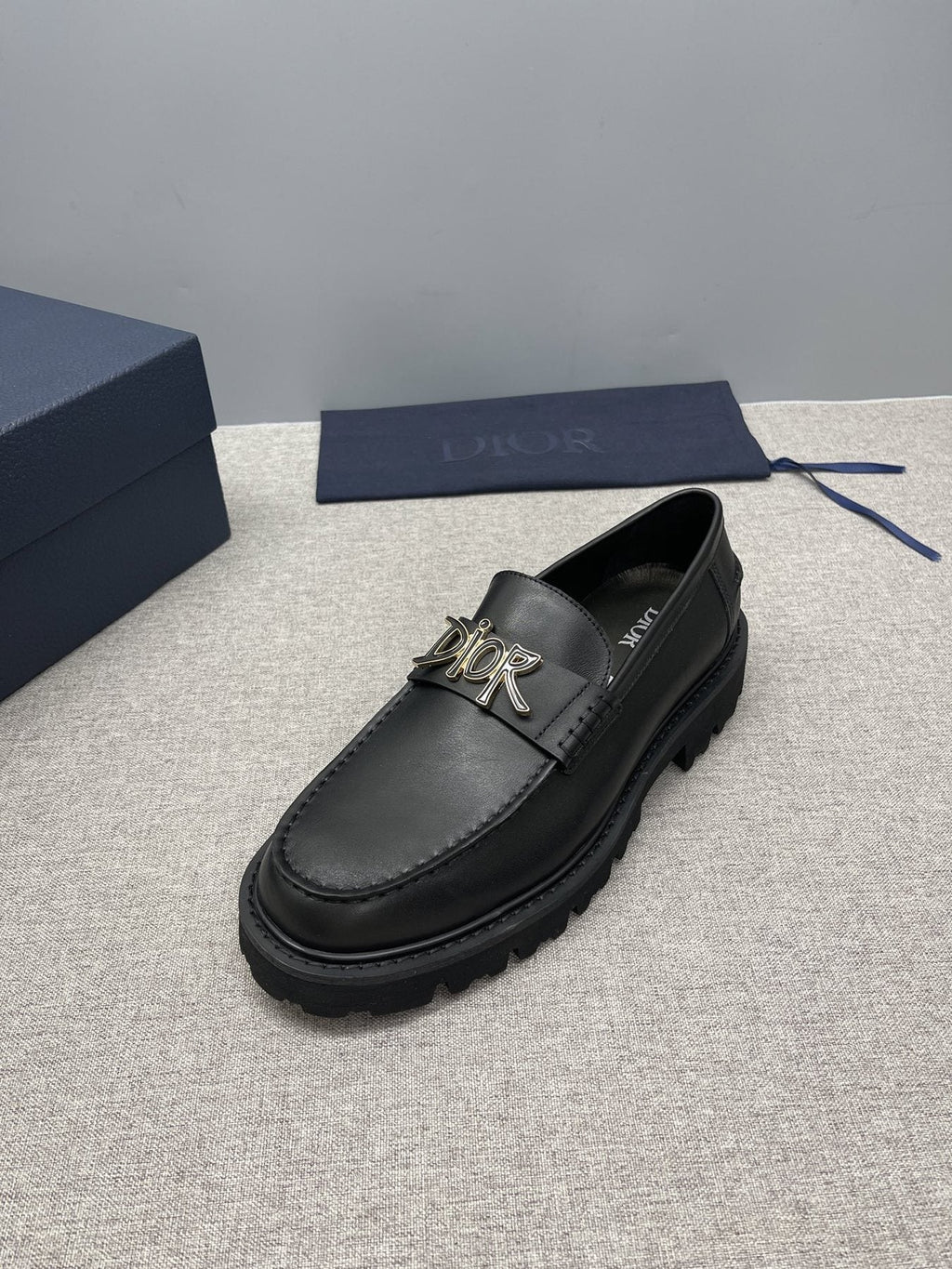 Dior Men's Black Gold-Plaque Slip-On Shoes